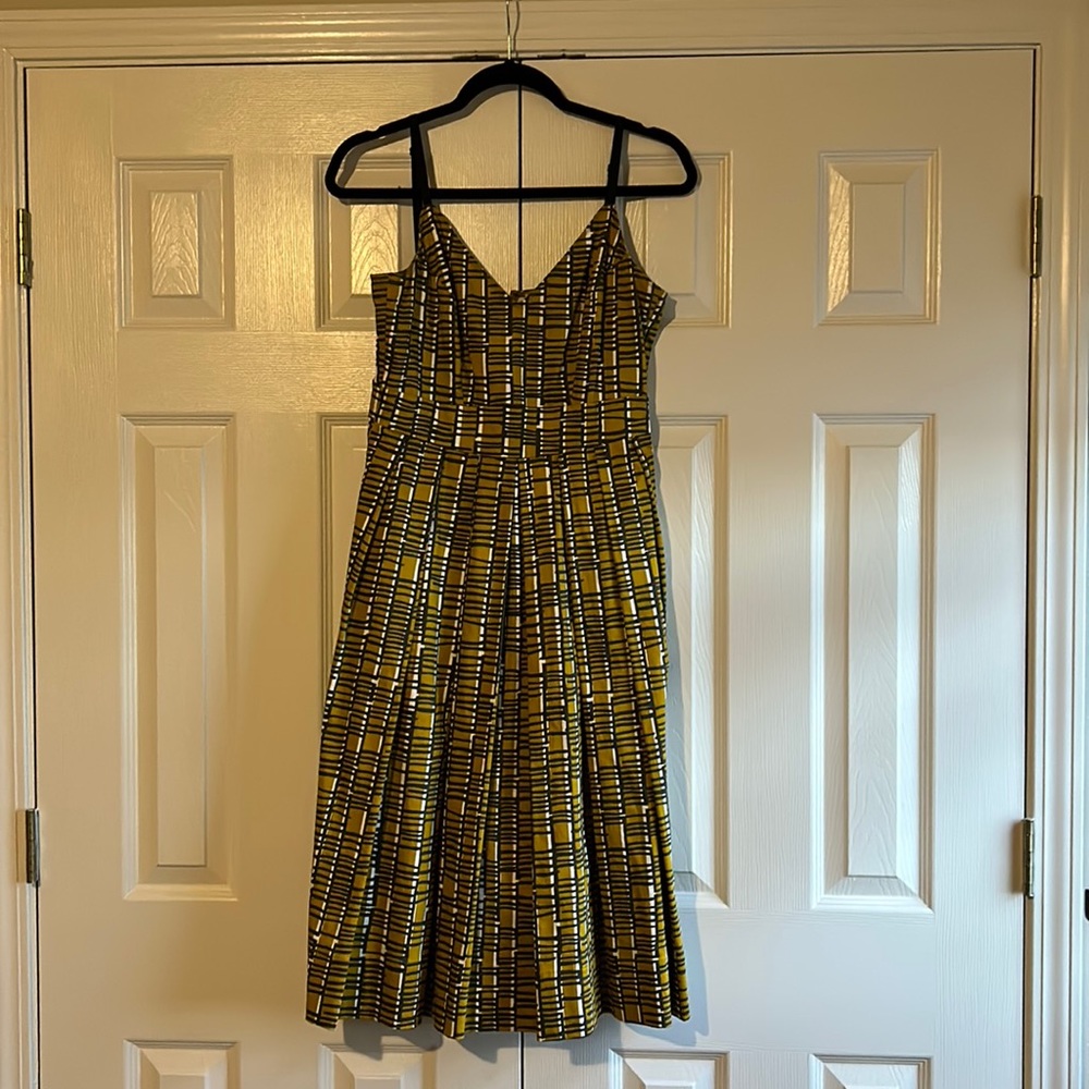 Tea length gray and mustard dress